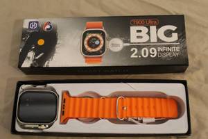 lot 143 image: watch with wireless charger