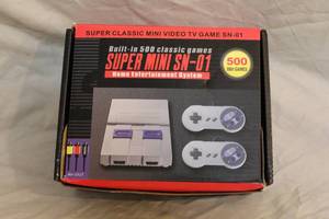 lot 144 image: plug and play game with 500 bult in games NIB