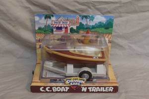 lot 163 image: This is a 1999 C.C. Boat N Trailer collectible toy from The Chevron Cars collection.