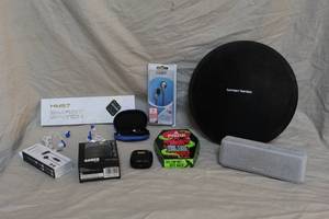 lot 209 image: Mixed lot like Sony Bluetooth speaker Harman Kardon Onyx Studio Bluetooth wireless speaker. Earbuds smartwatch and more see pictures