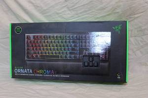 lot 214 image: Razer Ornata Chroma Mecha-Membrane gaming keyboard.