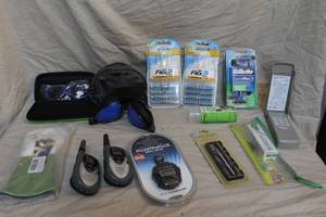 lot 215 image: Mixed lot walkie talkies razors headphones xacto knife toothbrush and toothpaste and more see pictures