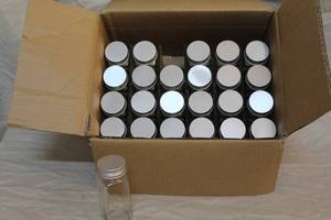 lot 218 image: 24 glass jars with lids could be used for spices crafts or anything