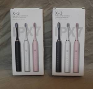 lot 255 image: 2-X3 Sonic Electric Toothbrushs