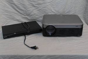 lot 260 image: Projector and DVD player both with out cords