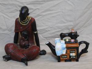 lot 270 image: African tribal woman with baby child sculpture figurine,and Houston Harvest Gifts ceramic sewing machine teapot.