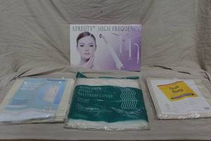 lot 318 image: high-frequency facial machine by Apreuty. This portable handheld device is used for skincare and hair treatment.  And more see pictures