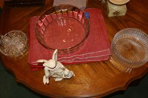 lot 33 image: Glass bowls, angel figurine and placemats as shown
