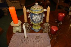 lot 34 image: Ceramic urn and candles as shown