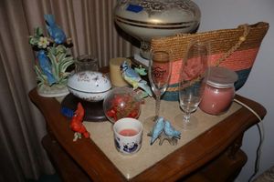 lot 22 image: Home decor bird figurines and candles