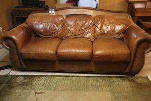 lot 47 image: Leather couch sofa as shown, see photos