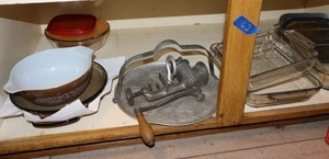 lot 62 image: Vintage Pyrex bowl and meat grinder, glass baking dishes