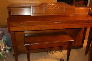 lot 80 image: Baldwin piano needs some attention