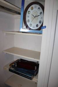 lot 150 image: Wall clock and red plastic trays