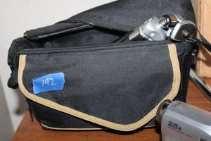 lot 142 image: JVC camcorder with tripod