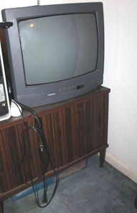 lot 136 image: Vintage TV and cabinet
