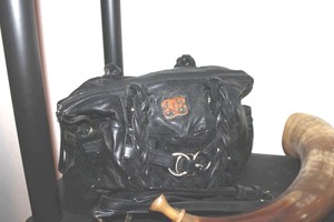 lot 131 image: Carved horn, digital alarm clock, purse