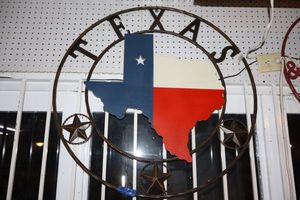 lot 2 image: Metal Texas circle sign with flag colors