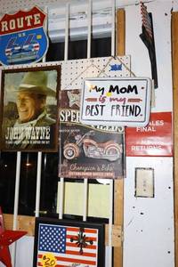 lot 9 image: Metal signs with cast iron flag wall sign