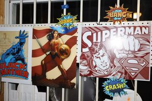 lot 10 image: Metal signs with super heroes