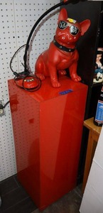 lot 53 image: Red display box, ceramic dog, and USB port light