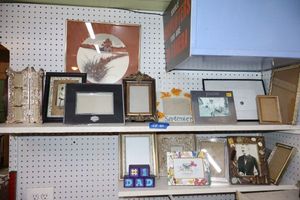 lot 60 image: Misc. photo frames including Harley Davidson frame