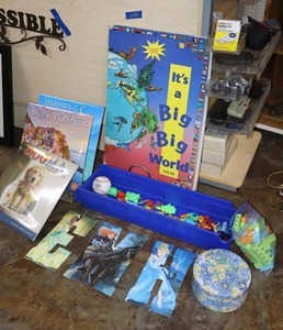lot 89 image: Toys, metal letters, calendars, and atlas book