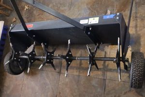 lot 101 image: 40 Brinly-Hardy tow behind aerator model PA-4038H