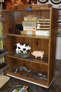lot 92 image: Bookshelf display on wheels (not contents)