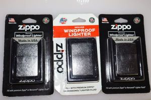 lot 107 image: Three Zippo lighters (unopened)