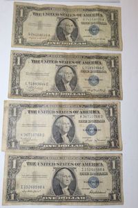lot 151 image: 4 US silver certificates One dollar bills