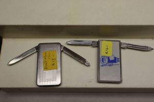 lot 176 image: Knife money clips