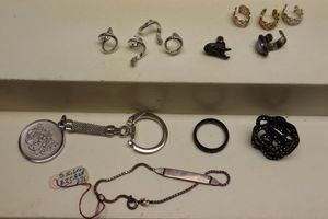 lot 178 image: Jewelry Silver marked bracelet, ear clips, key ring and more