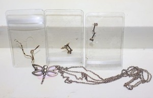 lot 181 image: Jewelry Silver marked dragonfly necklace, and Misc. piercings