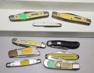 lot 202 image: Pocket knives as shown