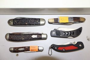 lot 205 image: Pocket knives as shown