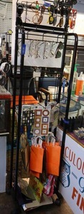 lot 164 image: Black wire rolling display stand (not contents)