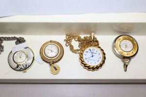 lot 221 image: Pendant and pocket watch necklaces