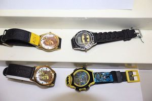 lot 249 image: Lion King and Batman watches