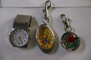 lot 329 image: Keychain watches and clip