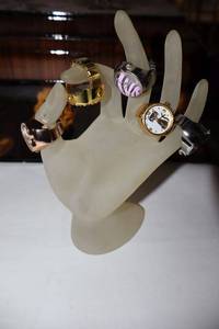 lot 342 image: Hand ring display with ring watches