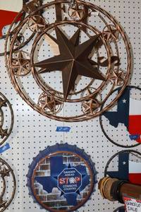 lot 407 image: Metal signs 2 Texas star, metal bottle cap Texas Cowboys sign