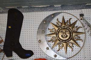 lot 405 image: Metal signs sunmoon and Welcome boot