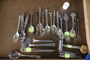 lot 363 image: Vintage silver spoons, razor, and forks. Three Forks are marked Sterling, some are stainless, some are other.