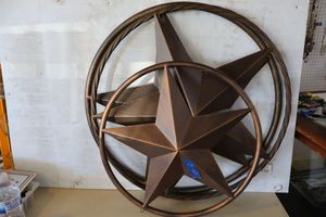 lot 403 image: Three metal star signs