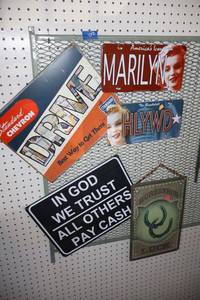 lot 402 image: Metal signs with Marilyn license plates