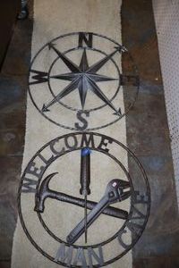 lot 401 image: Metal signs Welcome man cave, N-S-E-W