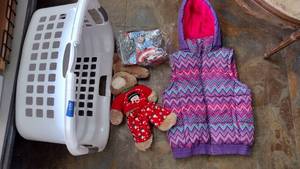 lot 538 image: Kids hooded puffy sleeveless coat, Captain America lunch box, Teddy bear and laundry basket