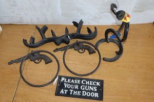 lot 486 image: Cast iron towel holders and decor items