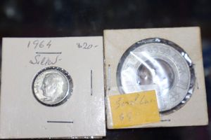 lot 500 image: Coins 1964 Roosevelt Dime and good luck coin with penny in the center